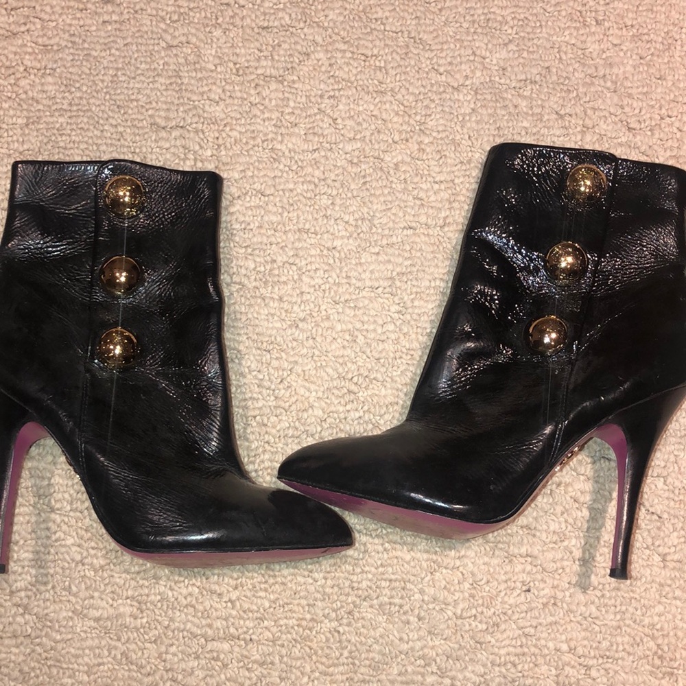 Betsey Johnson Black bootie with gold circular snaps